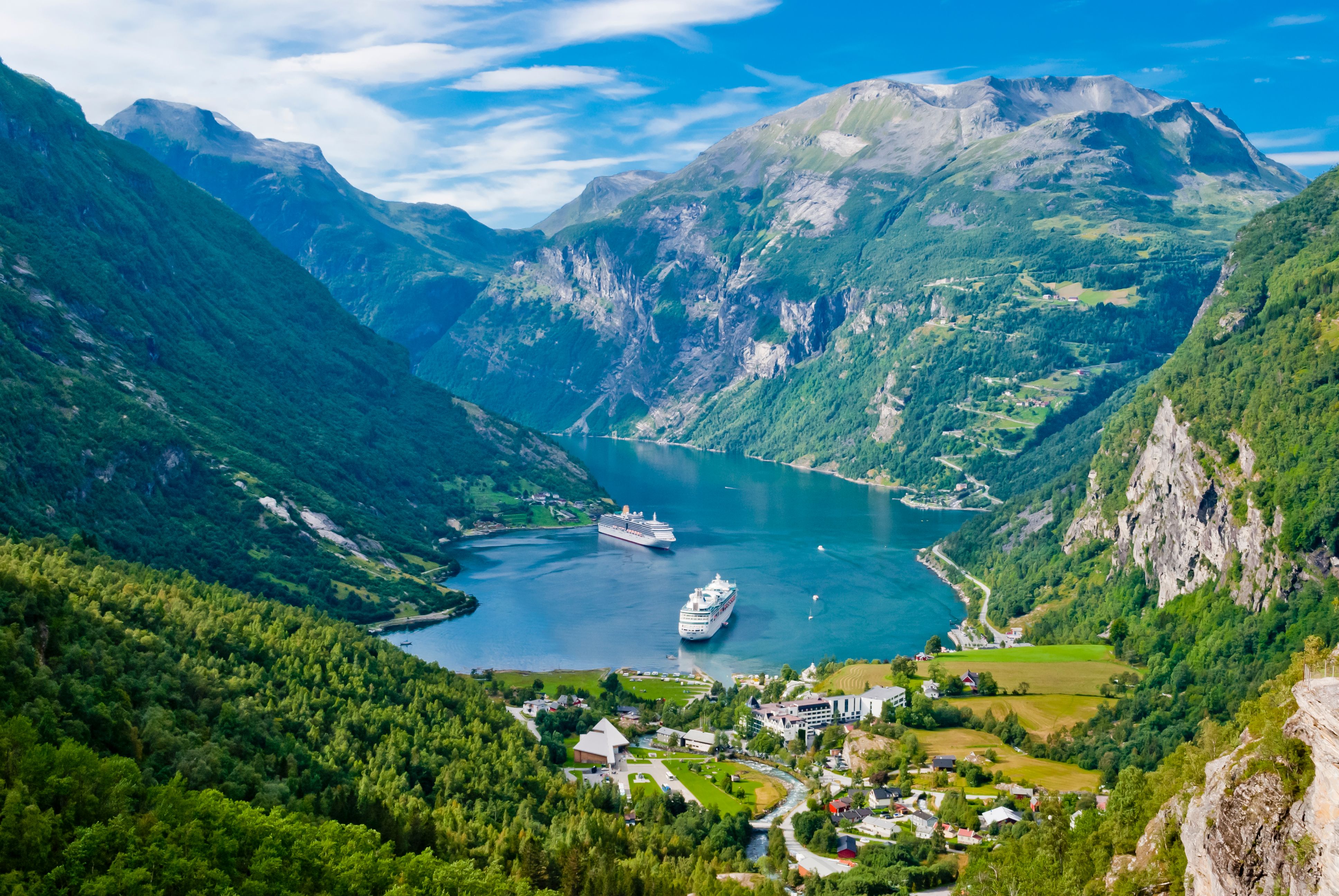 View of two cruise ships in Geiranger Fjord, Norway