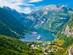 View of two cruise ships in Geiranger Fjord, Norway