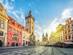 View of the Old Town square in Prague at sunrise with the clock tower and Church of Our Lady before Týn