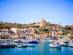 View of fishing boats in a blue bay on Gozo island, Malta