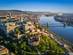 Aerial skyline view of Budapest at sunrise with Szechenyi Chain Bridge and Buda Castle in the foreground