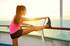Woman stretching on cruise ship