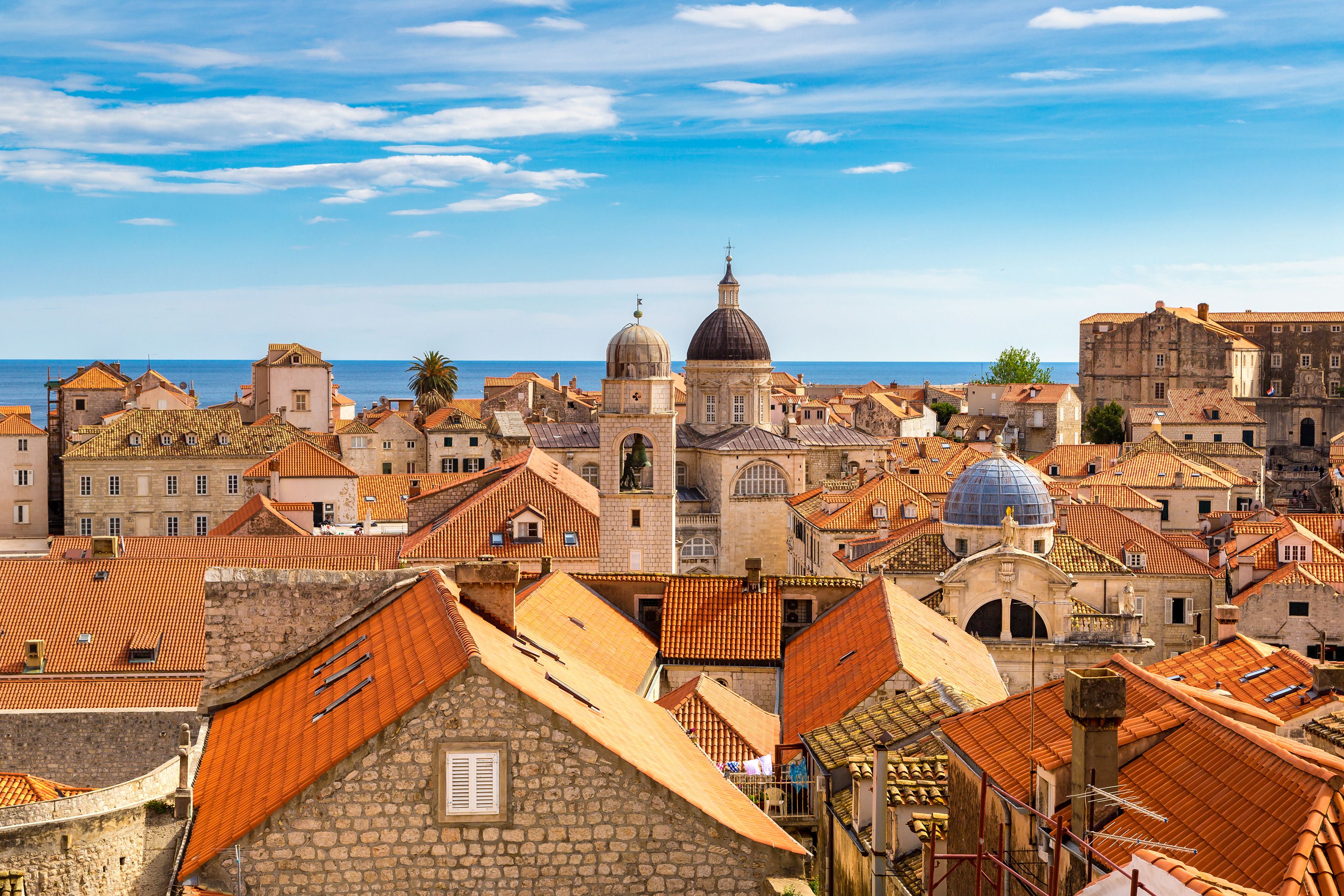 View over Dubrovnik Old Town rooftops on a beautiful summer day, Croatia