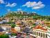 A view of Plaka neighbourhood in the centre of Athens with the Acropolis in the background