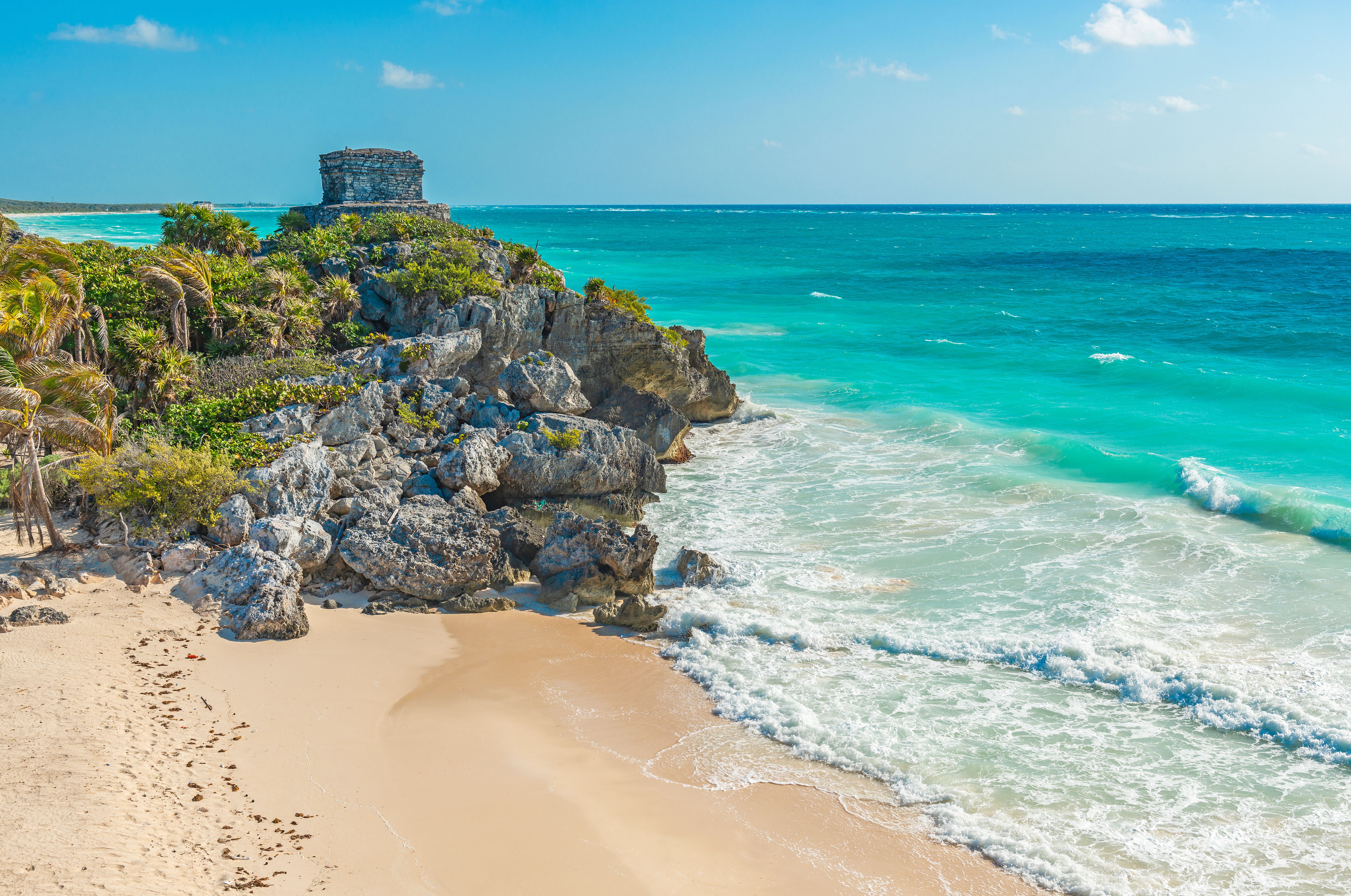 View of Tulum Beach with ancient temple in Mexico