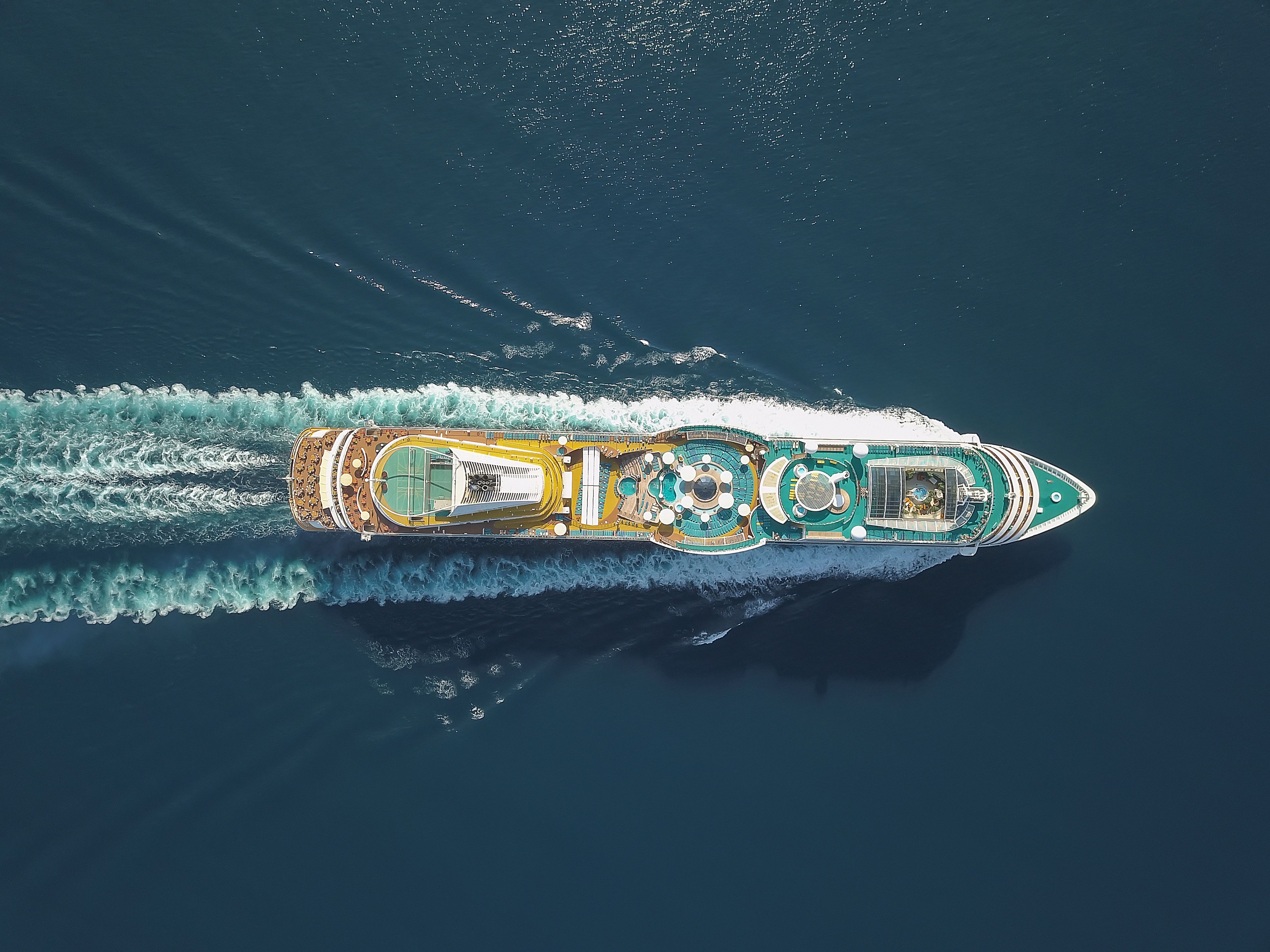 A bird's-eye-view of a cruise ship sailing in Ksamil, Albania.