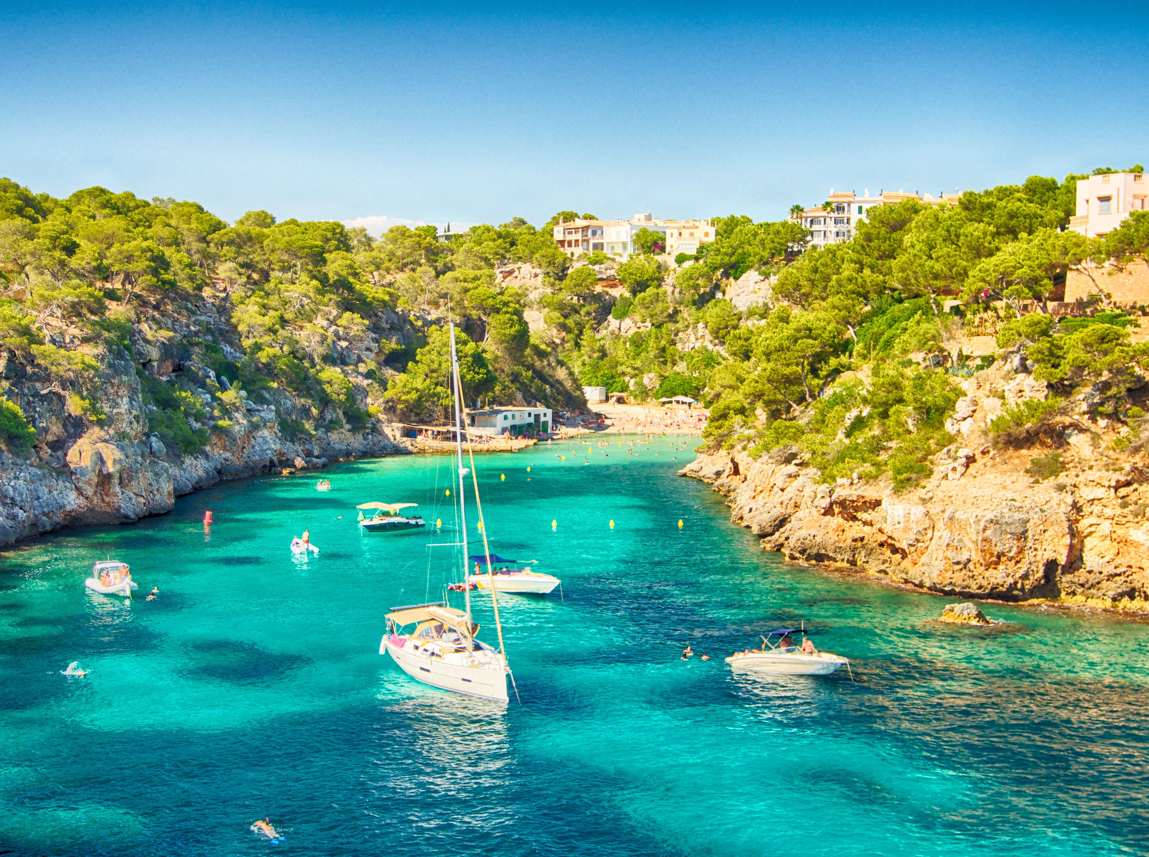 View of a picturesque cove in Majorca with sailing boats