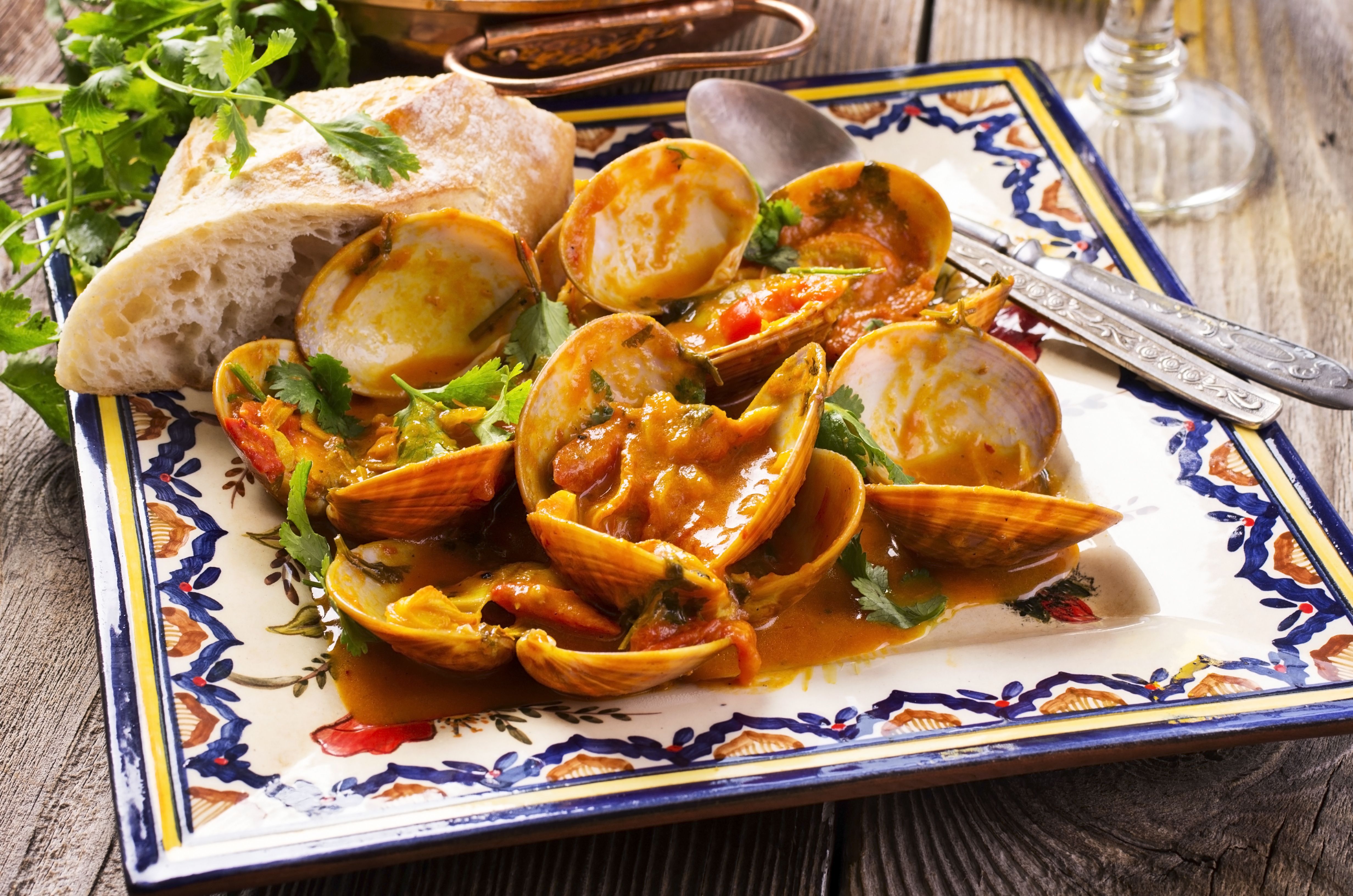 A traditional cataplana stew with clams