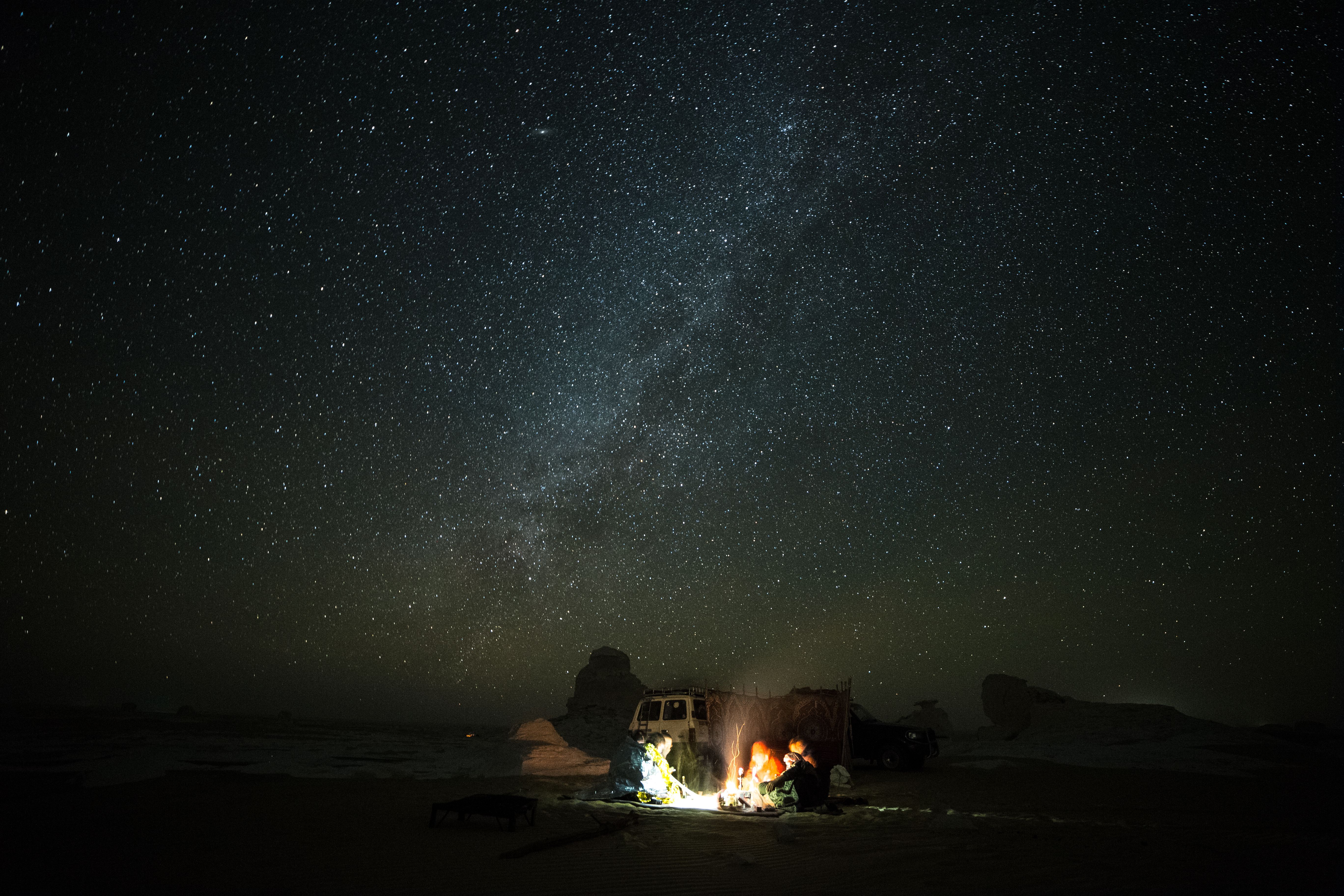 A nighttime shot of camping under the stars in the White Desert in Egypt