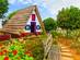 Traditional rural house with thatch roof in Santana village, Madeira