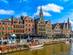 View of Graslei quay and Leie river in the historic city centre in Ghent, Belgium.