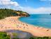 People on the beach at Blackpool Sands in Devon.