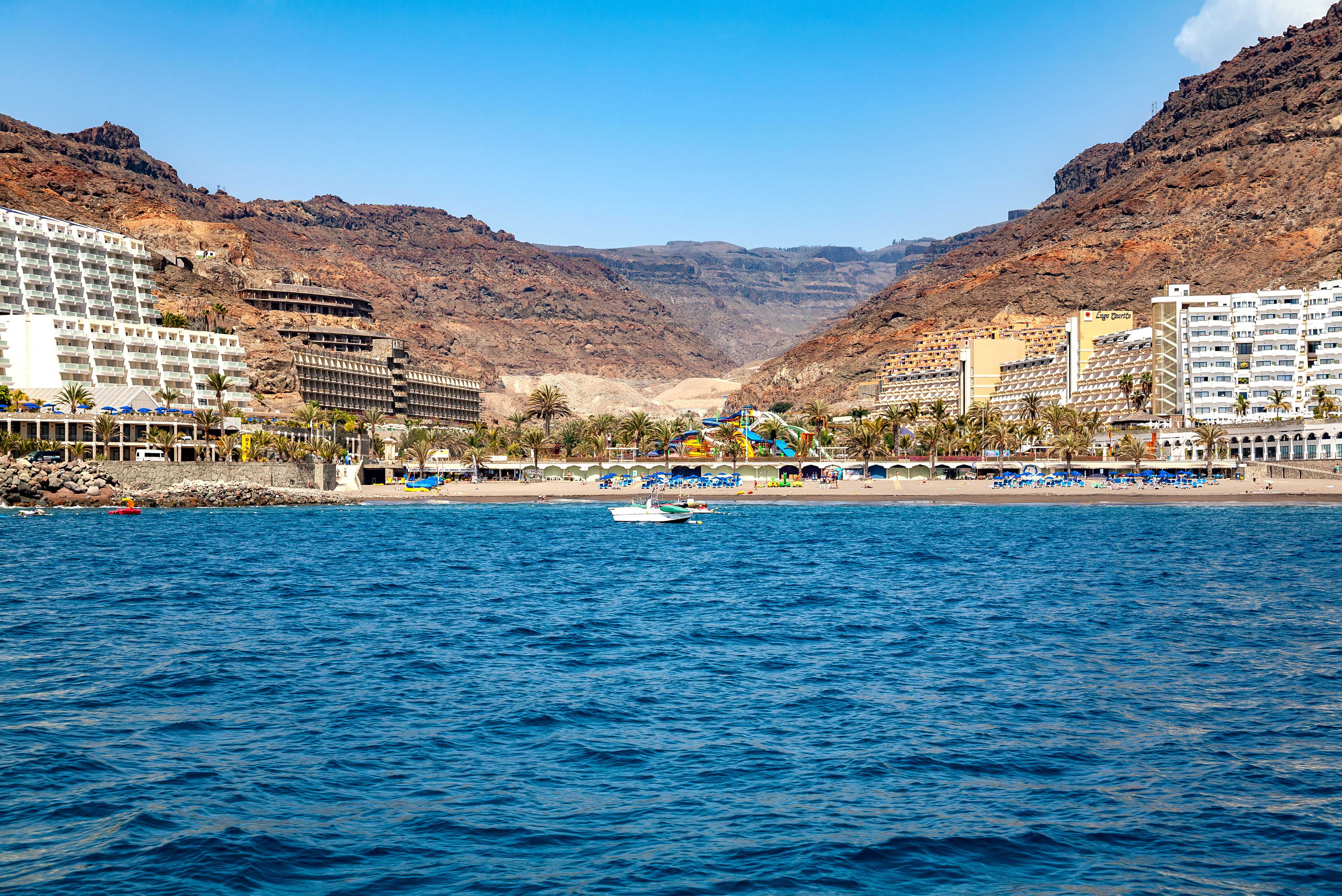View across the sea of Playa del Diablito in the reosrt of Taurito in Gran Canaria