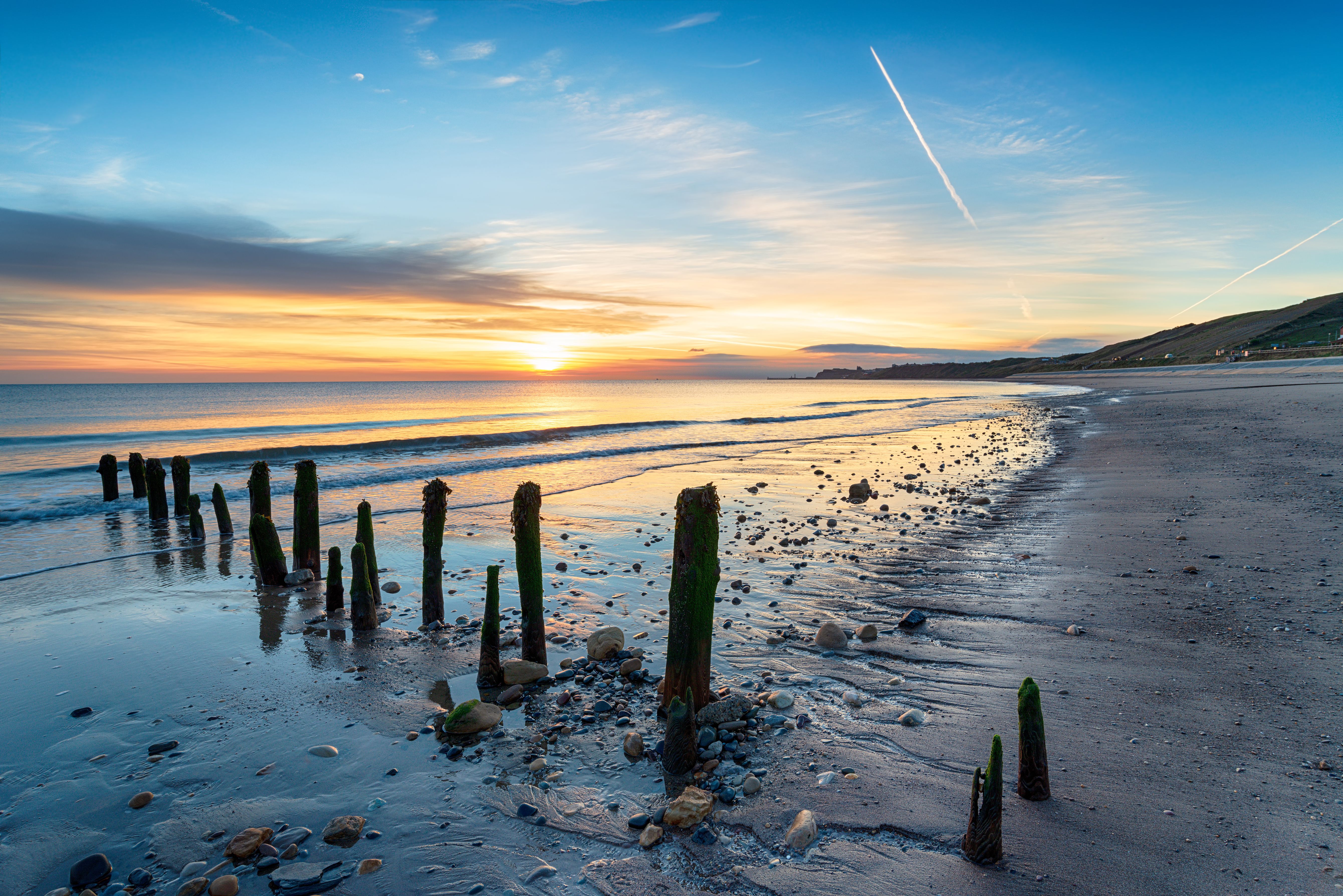 A sunset view of Sandsend Beach near Whitby in North Yorkshire