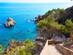 Cami de Ronda footpath down to Lloret de Mar of Costa Brava in Spain in a sunny day showing the sea