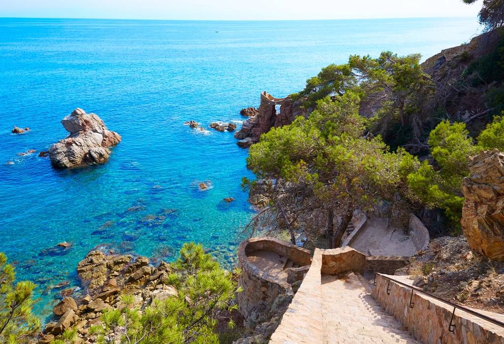 Cami de Ronda footpath down to Lloret de Mar of Costa Brava in Spain in a sunny day showing the sea
