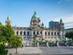 View of the Belfast City Hall in summer under sunny blue sky