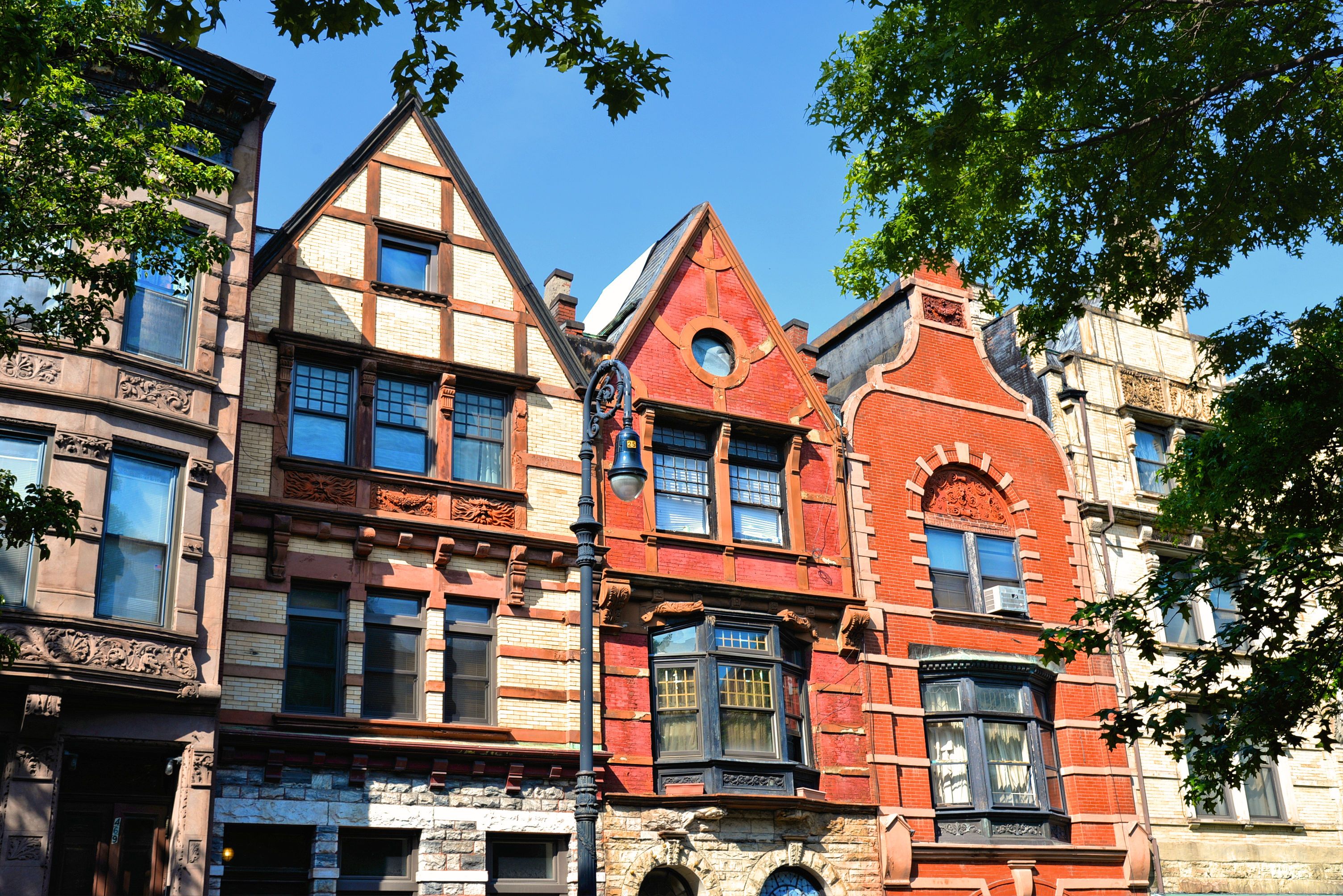 Colourful house fronts in Mount Morris Park Historic District, Harlem, New York City