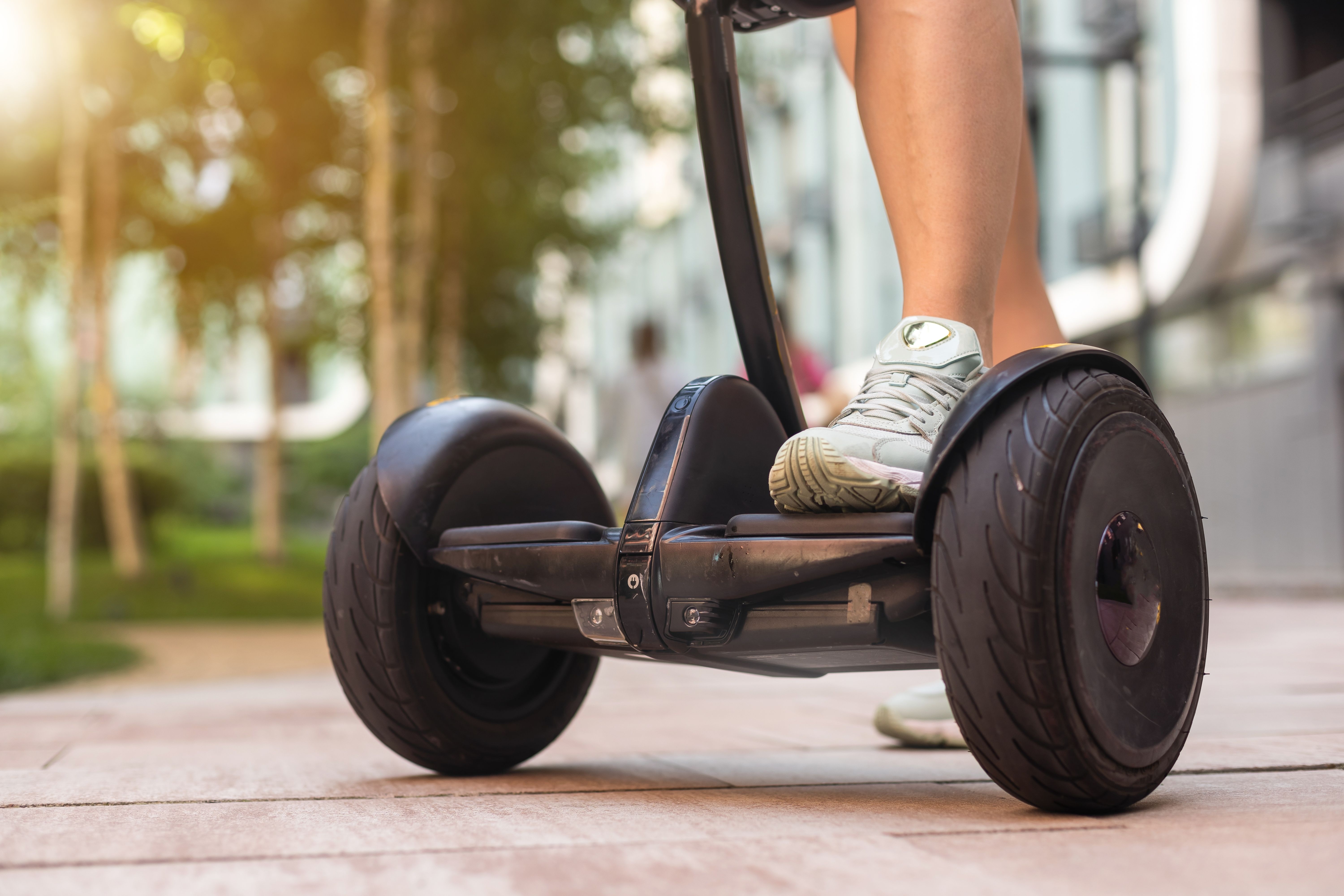 A close up view of the wheels of a segway