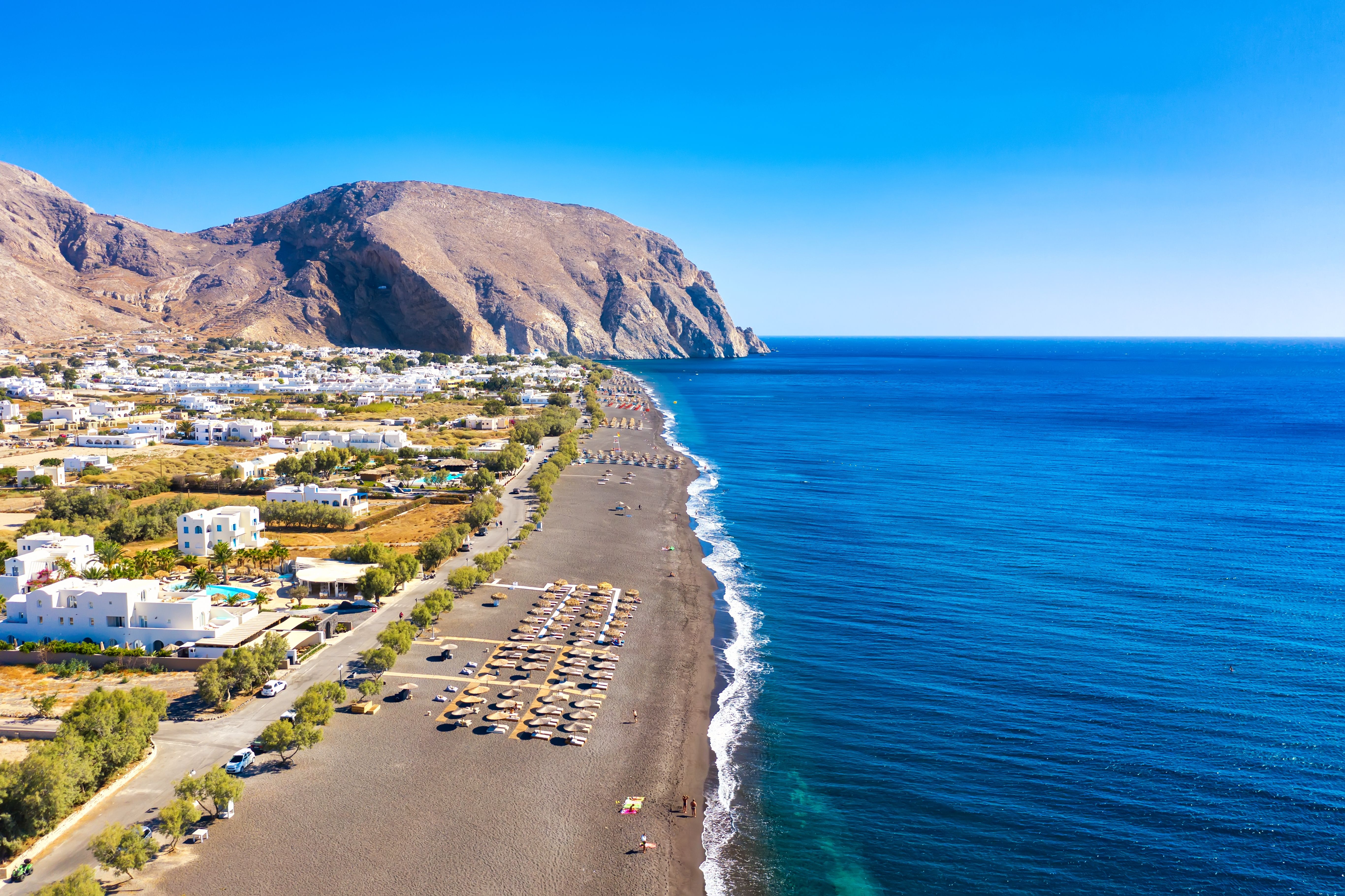 An aerial view over Perissa beach in Santorini