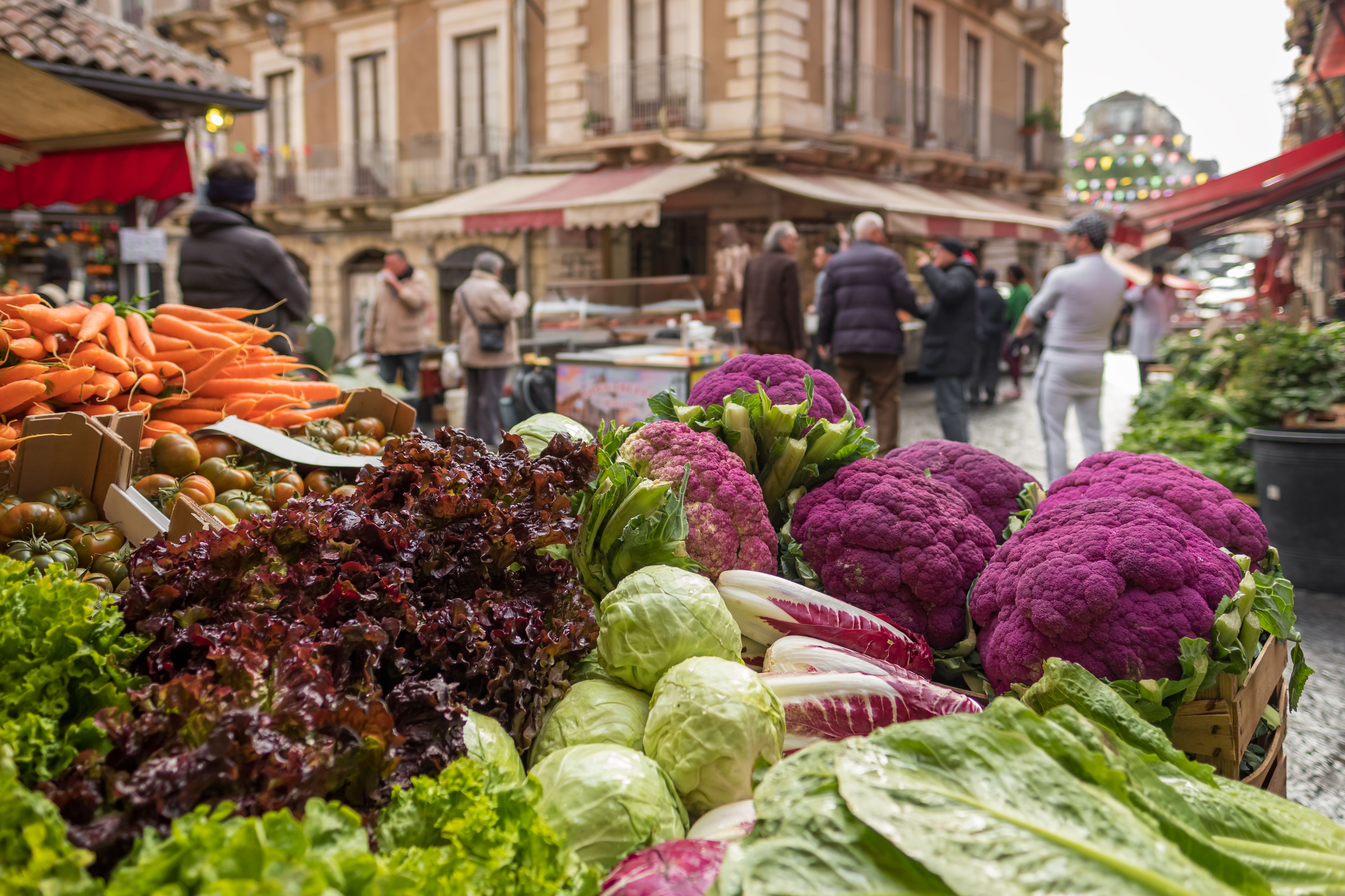 Fresh vegetables at famous Ballaro market in Palermo, Sicily, Italy