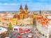 A panoramic view of Prague Old Town at Christmas with festive market stalls