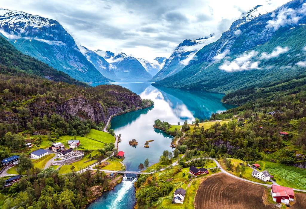 A view of the beautiful nature in Norway showing the natural landscape with snowy mountains and lake