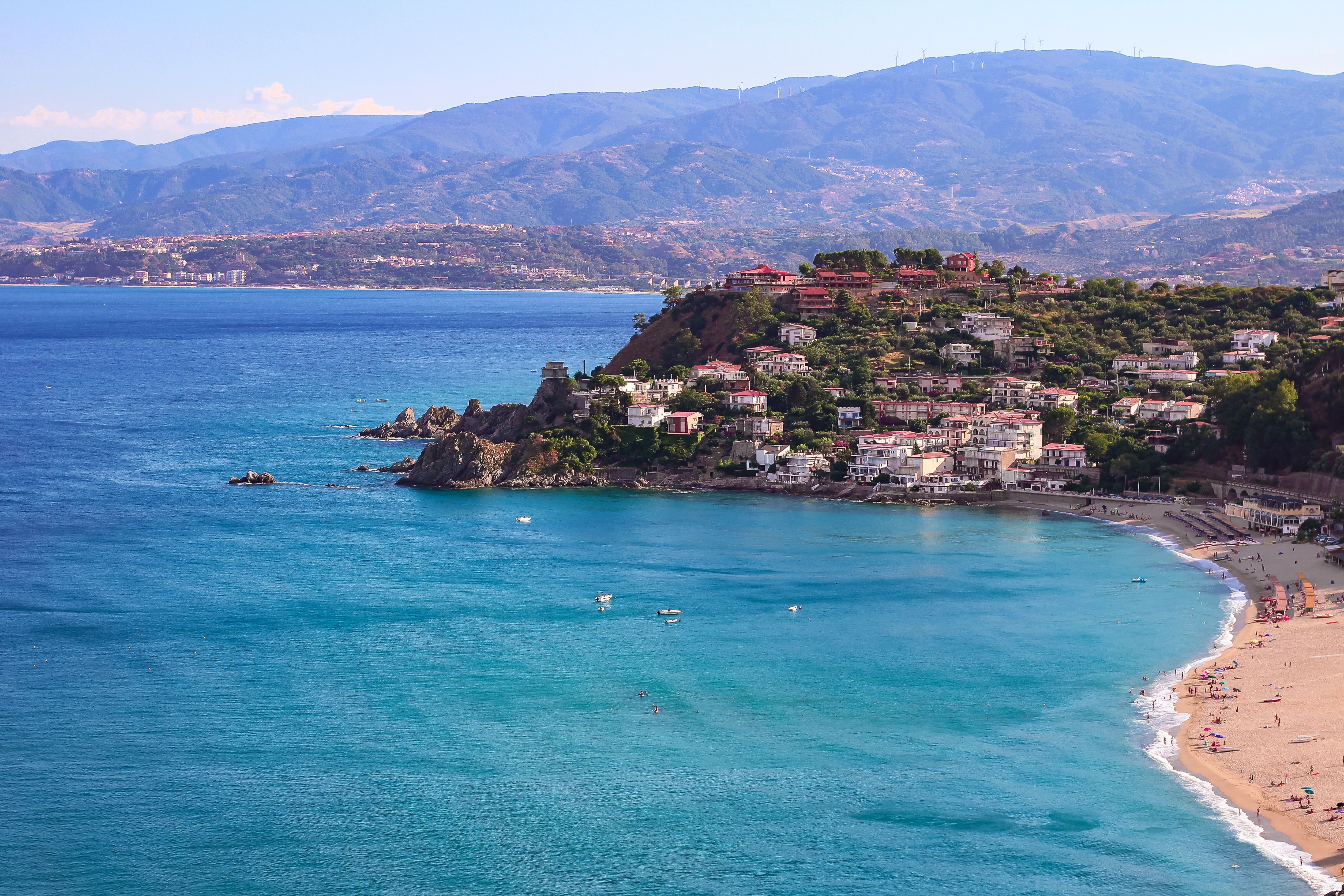 An aerial view of Caminia town and beach in Calabria, Italy