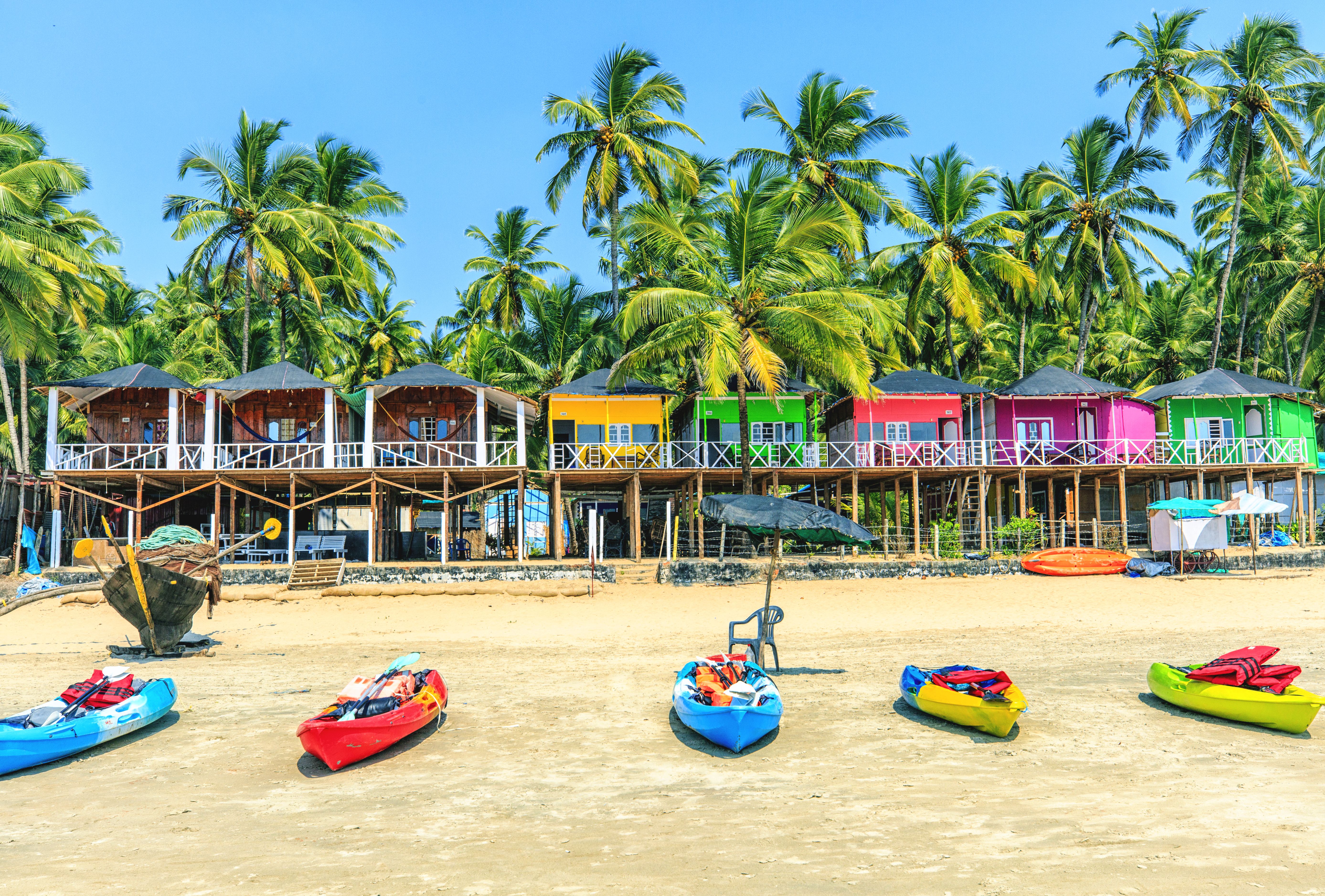 Colourful bungalows on Palolem beach in Goa, India