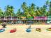 Colourful bungalows on Palolem beach in Goa, India