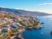 An aerial view of Funchal city and coastline on the island of Madeira in Portugal