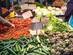 Street market with zucchinis, artichokes, tomatoes and other vegetables in Rome, Italy