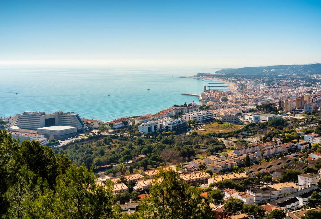 Aerial view of Sitges city scape and sea