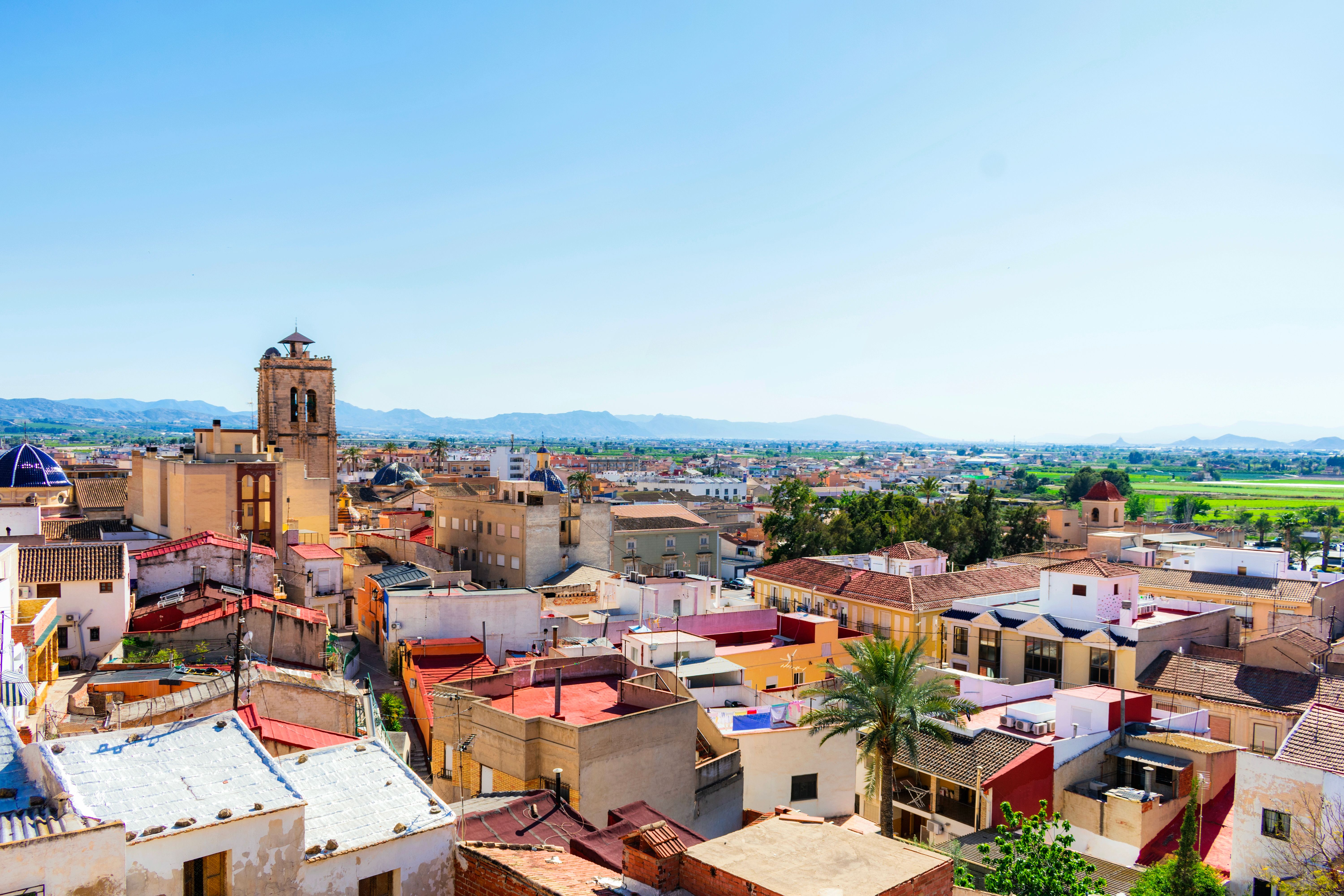 Panoramic view of the rooftops and a bell tower in the Spanish city of Orihuela