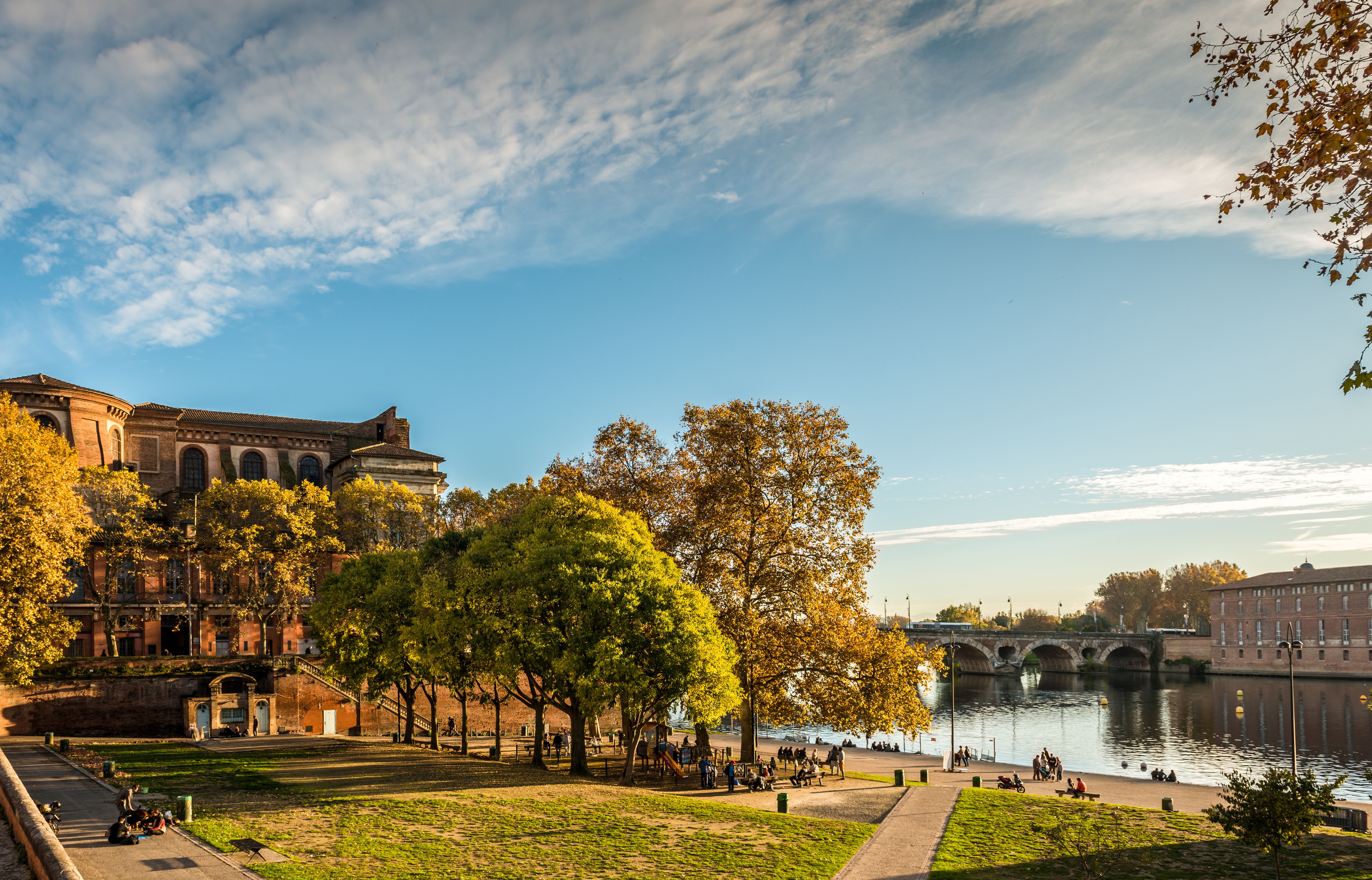 View of the small riverside park, Place de la Daurade, in Toulouse.