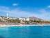 A view across the sea of Playa Blanca beach in Lanzarote, Canary Islands