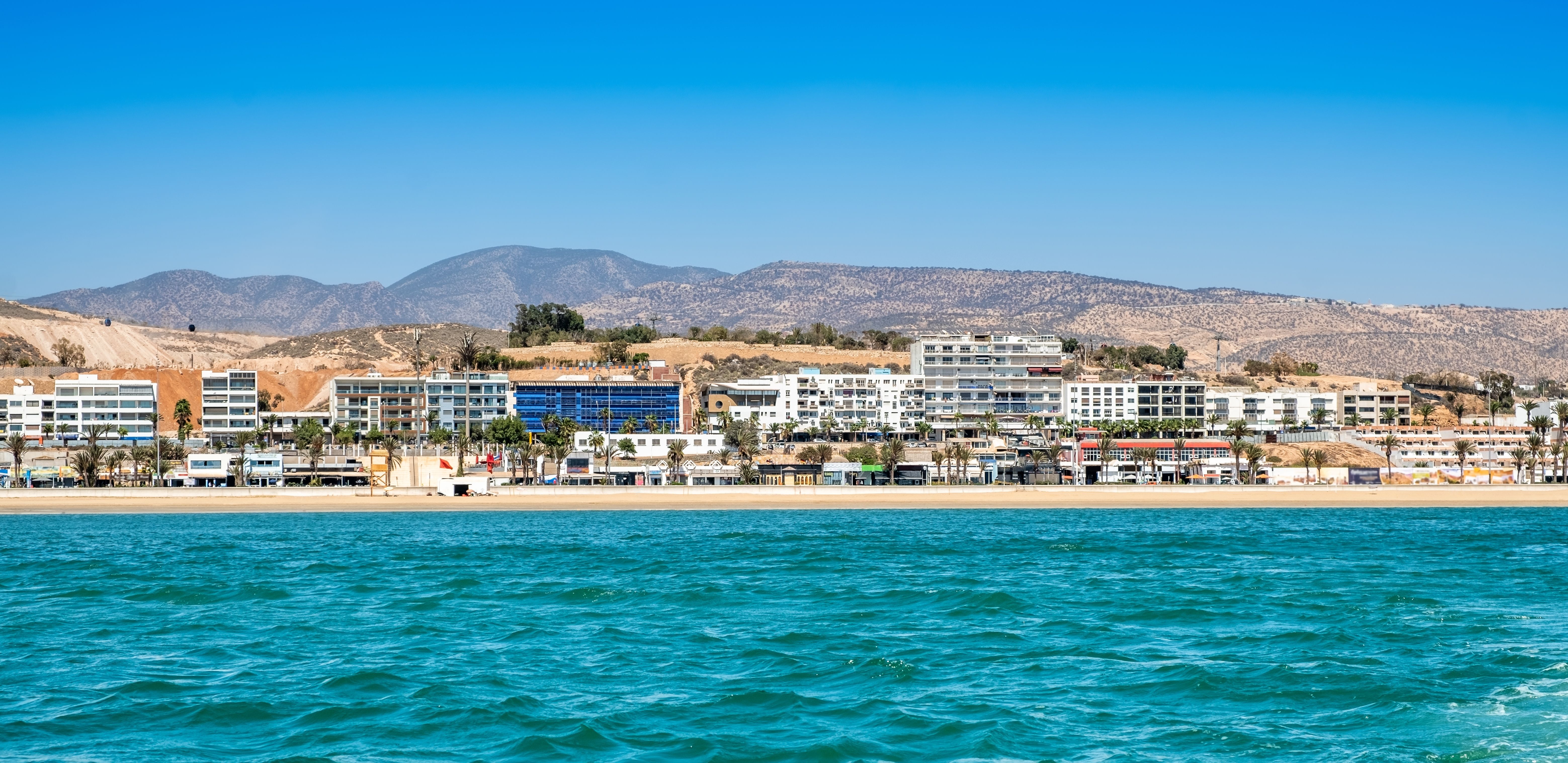A view across the sea of the beach and resort of Agadir in Morocco