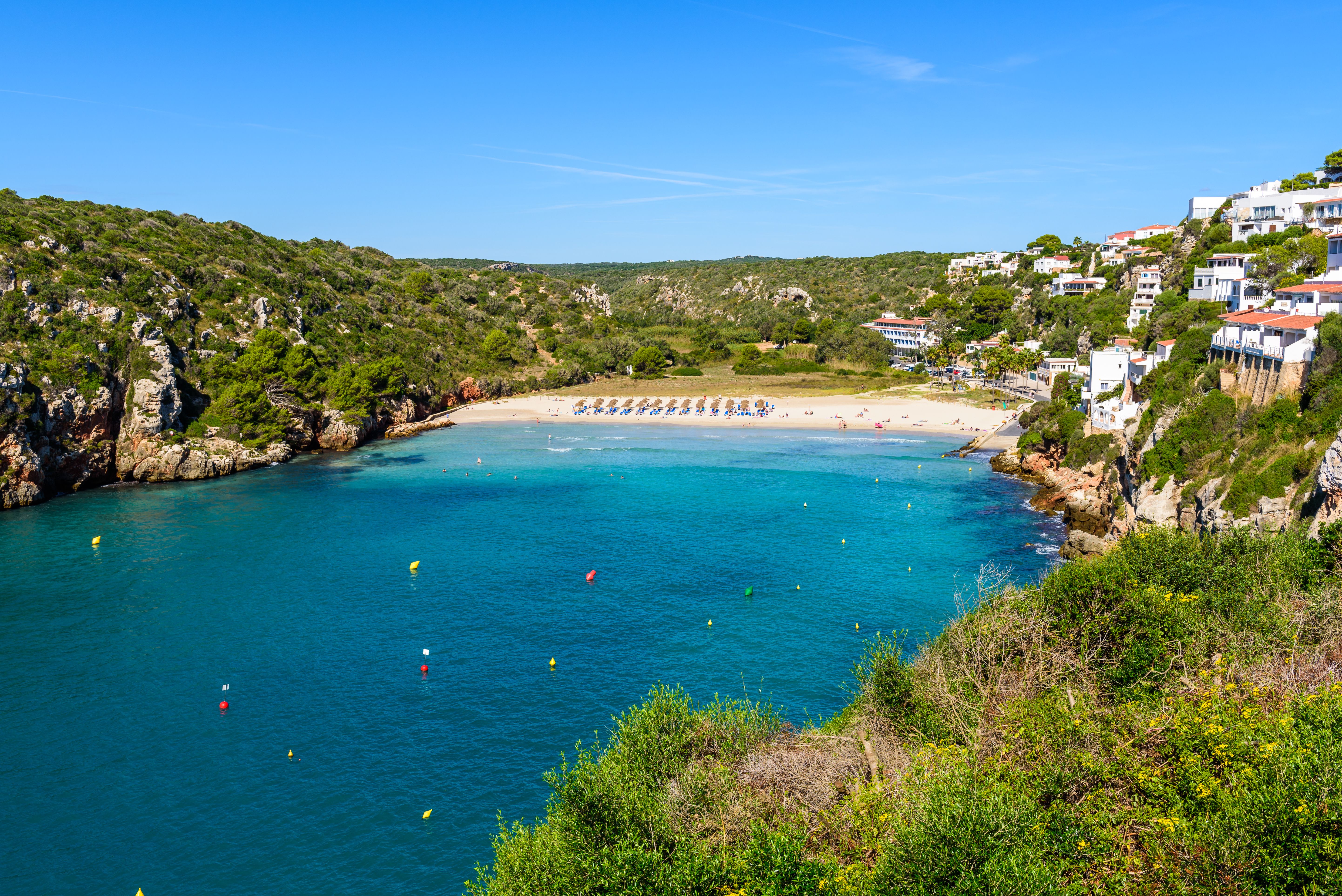 A view of Cala 'n Porter beach in Menorca, Balearic Islands