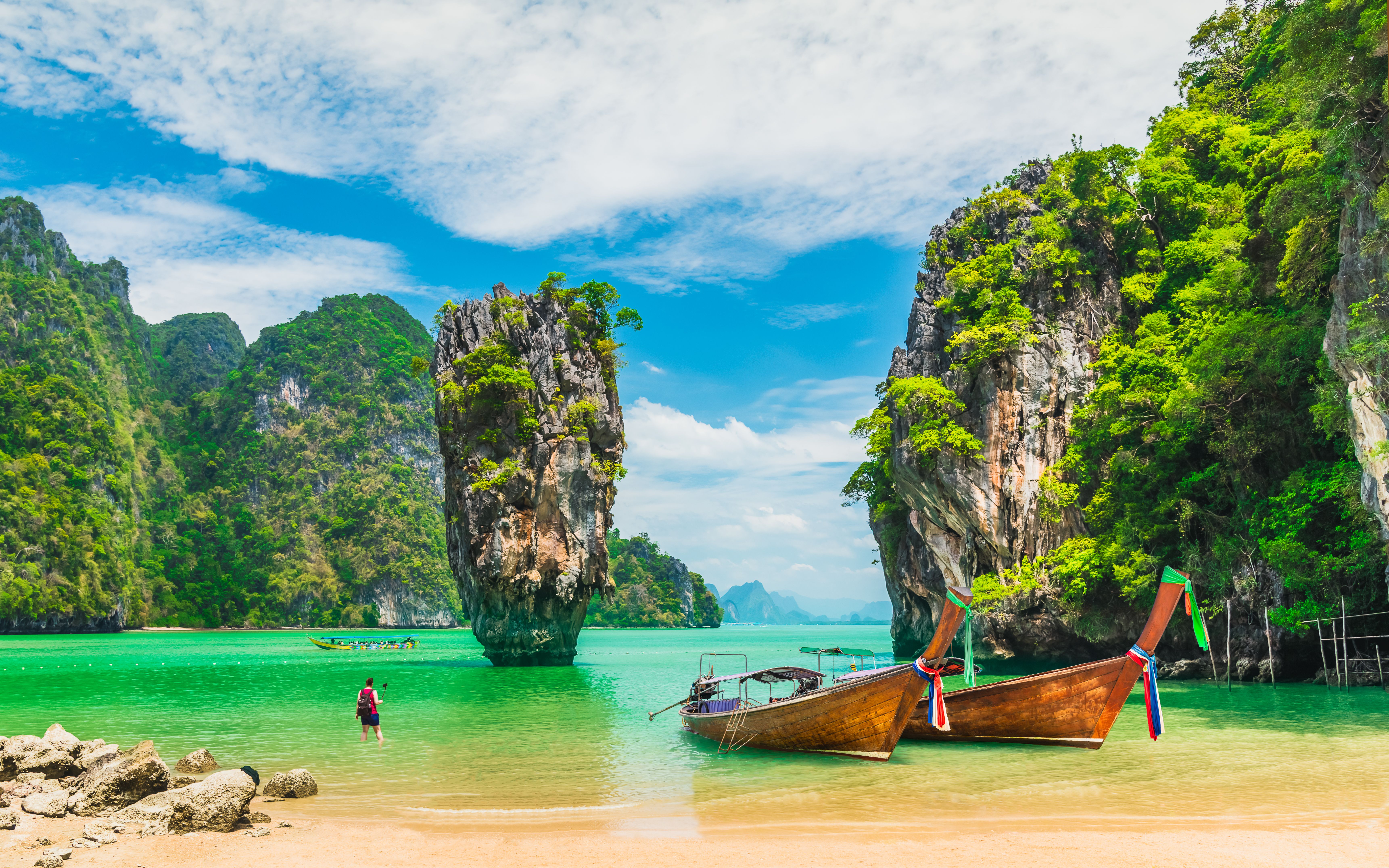 A tropical beach with floating mountains on the island of Phuket, Thailand