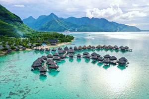 Landscape view of overwater bungalows in Mo'orea French Polynesia