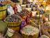 Colourful woven baskets and piles of spices and herbs in a market stall in Egypt