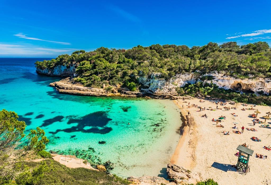 Beach, water and trees in Majorca