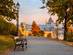 Early morning view of a park path looking out towards Budapest's Szechenyi Chain Bridge and Parliament Building