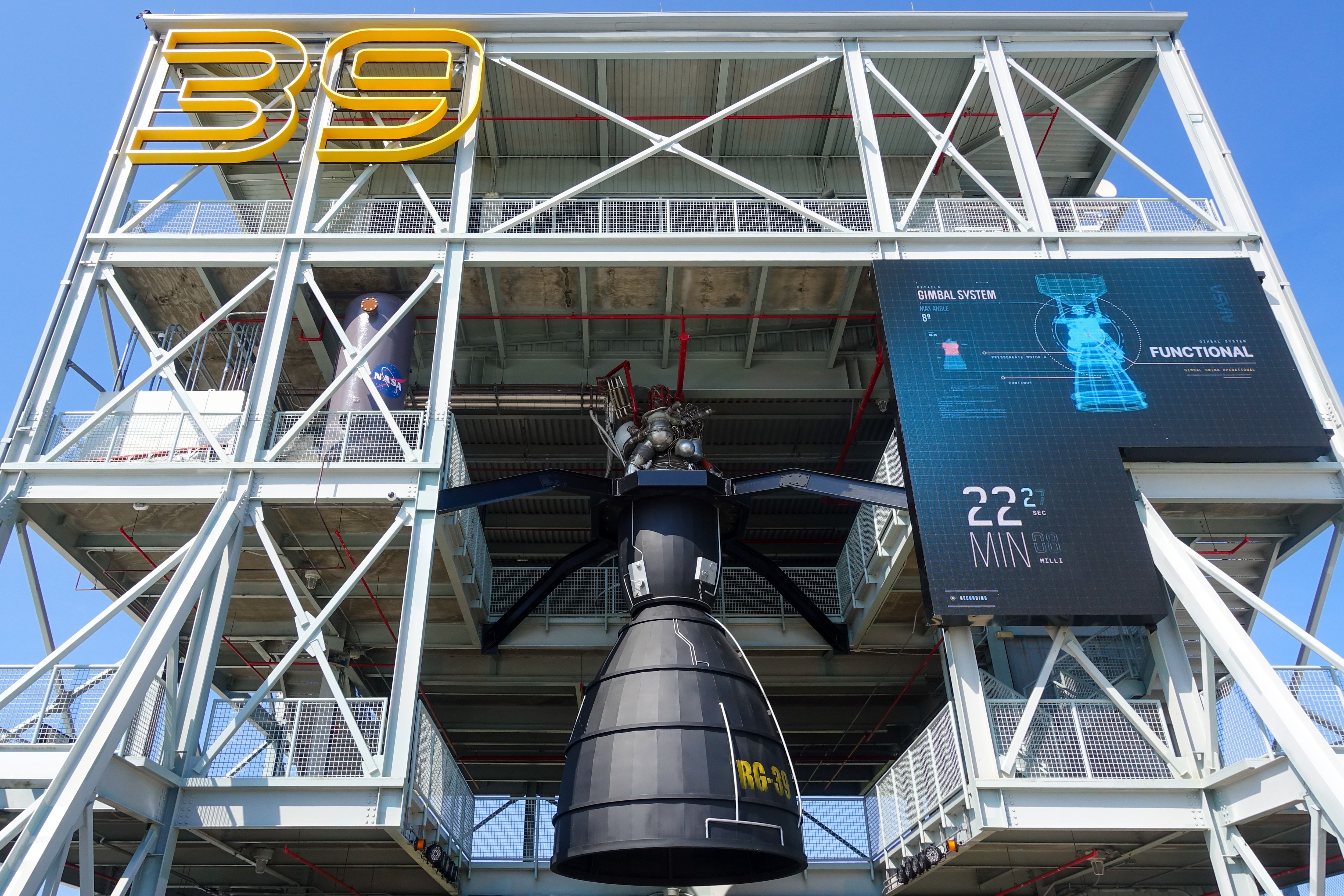 A gantry featuring a full-sized model of a space rocket engine