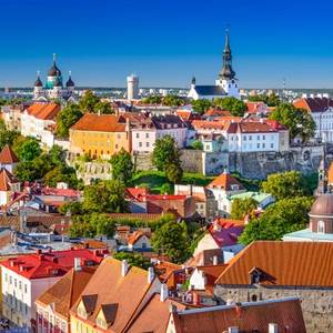 Rooftop view of Tallinn's old town and Toompea Hill on a bright day in Estonia