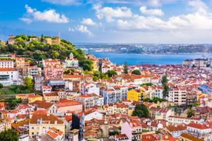 View of Lisbon's skyline, including the hilltop Sao Jorge castle and views over the Tagus River