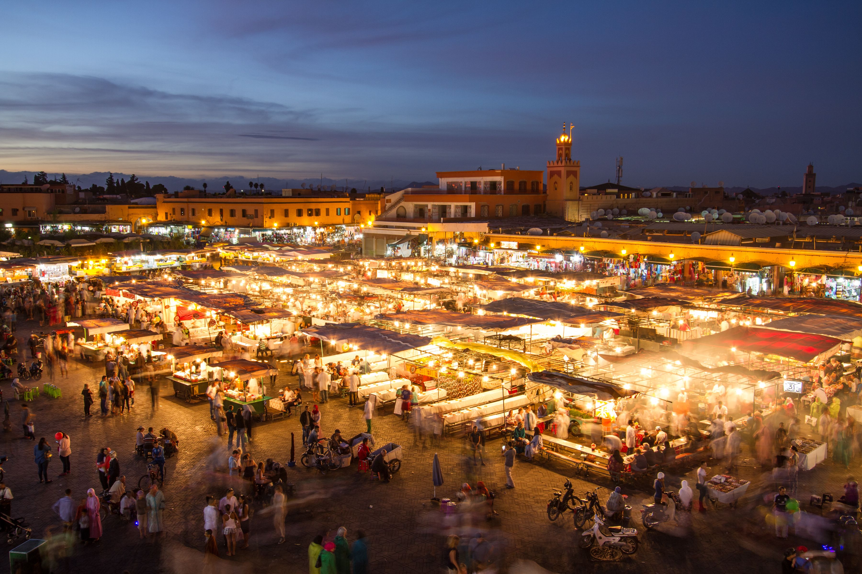 The famous Jamaa el Fna market square at dusk in Marrakesh, Morocco