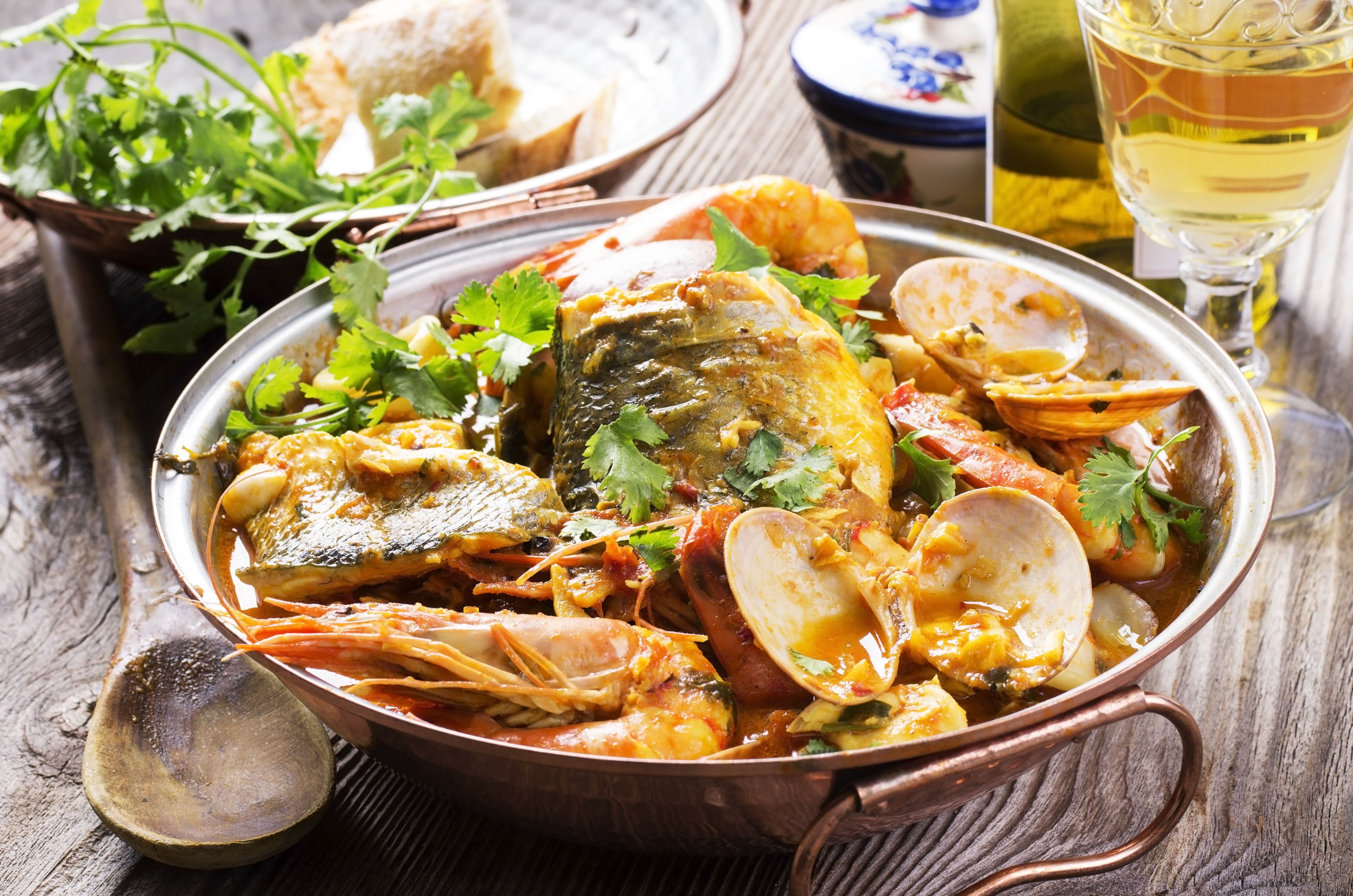A close up of seafood cataplana - a traditional Algarve dish