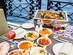 Traditional Egyptian food dishes laid out on a table by the river in Cairo, Egypt