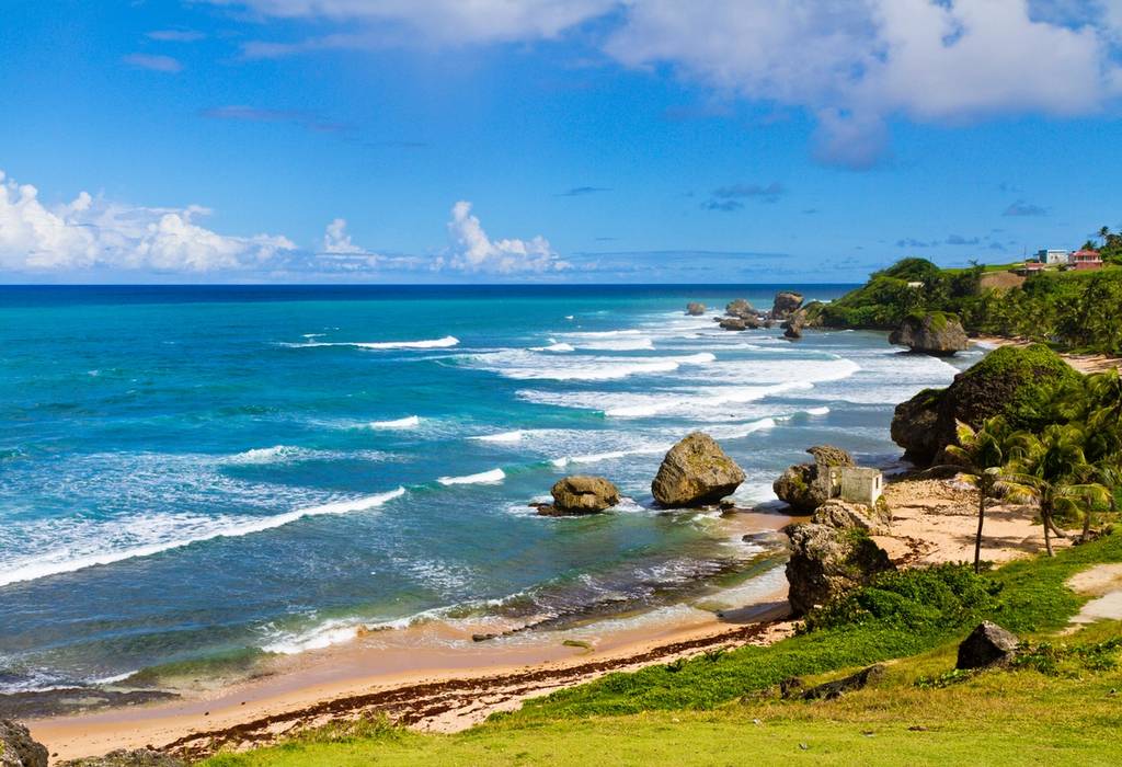 View of the golden sands and rocky formations of Bathsheba Beach in Barbados